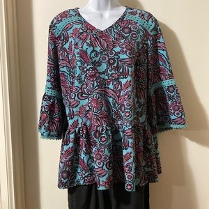 Ladies size M top.Pretty print in turquoise, deep pink/purple/blue and black.